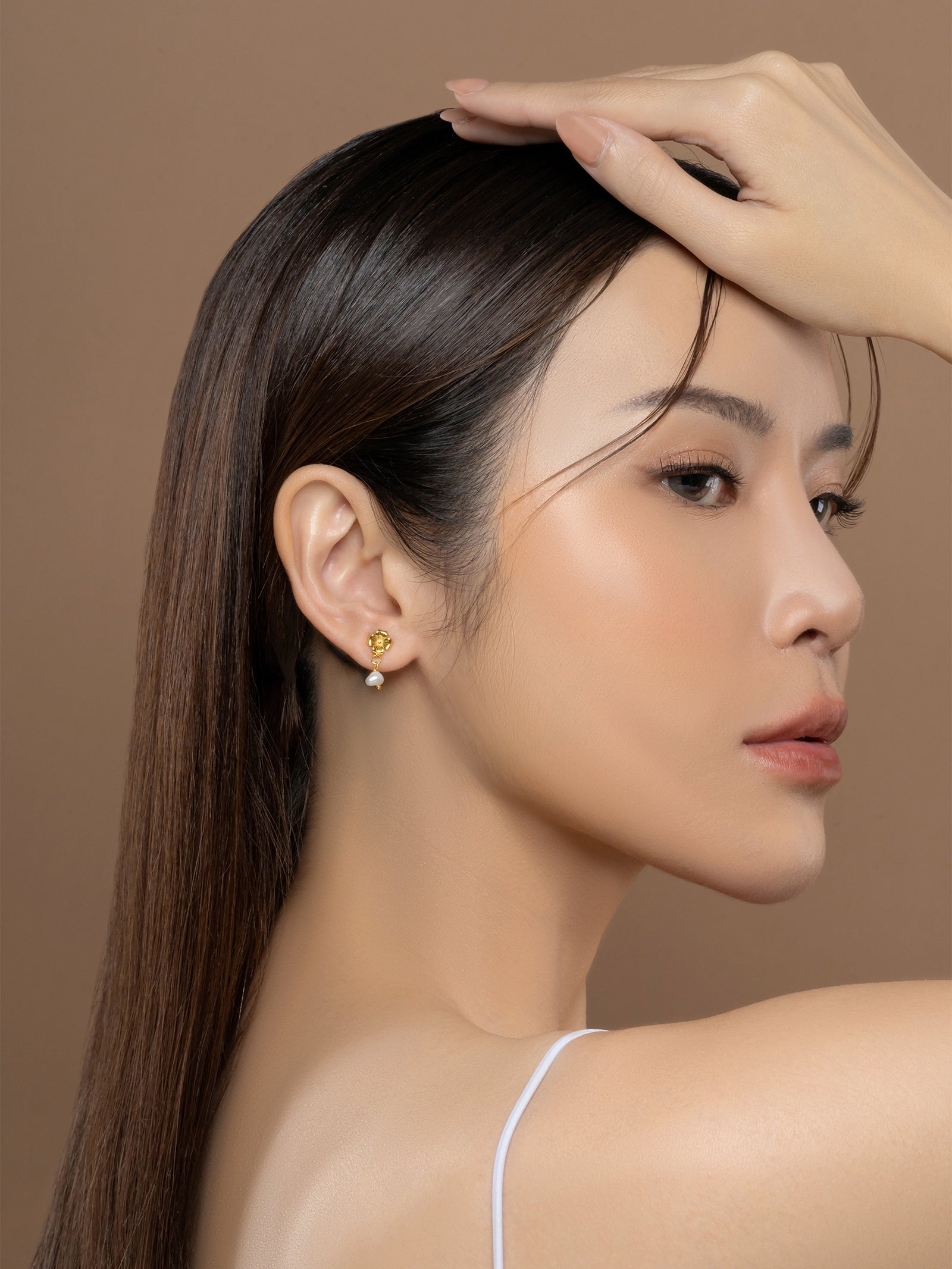 Tender Objects Fleur Pearl Drop Studs - Graceful earrings with delicate pearl drops, embodying timeless elegance for a sophisticated and chic look.